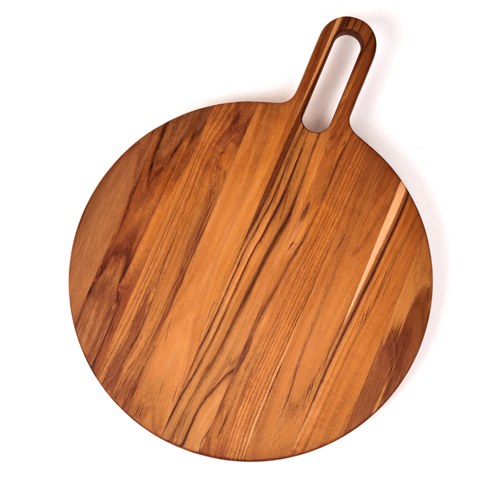 Large round teakwood serving board with a handle and natural wood grain patterns on a white background.