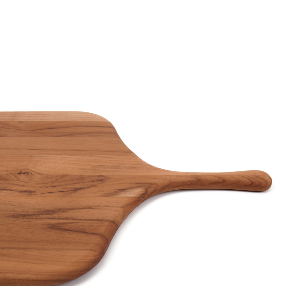 Small teakwood pizza peel with a slender canoe paddle handle and rich natural edge grain texture.