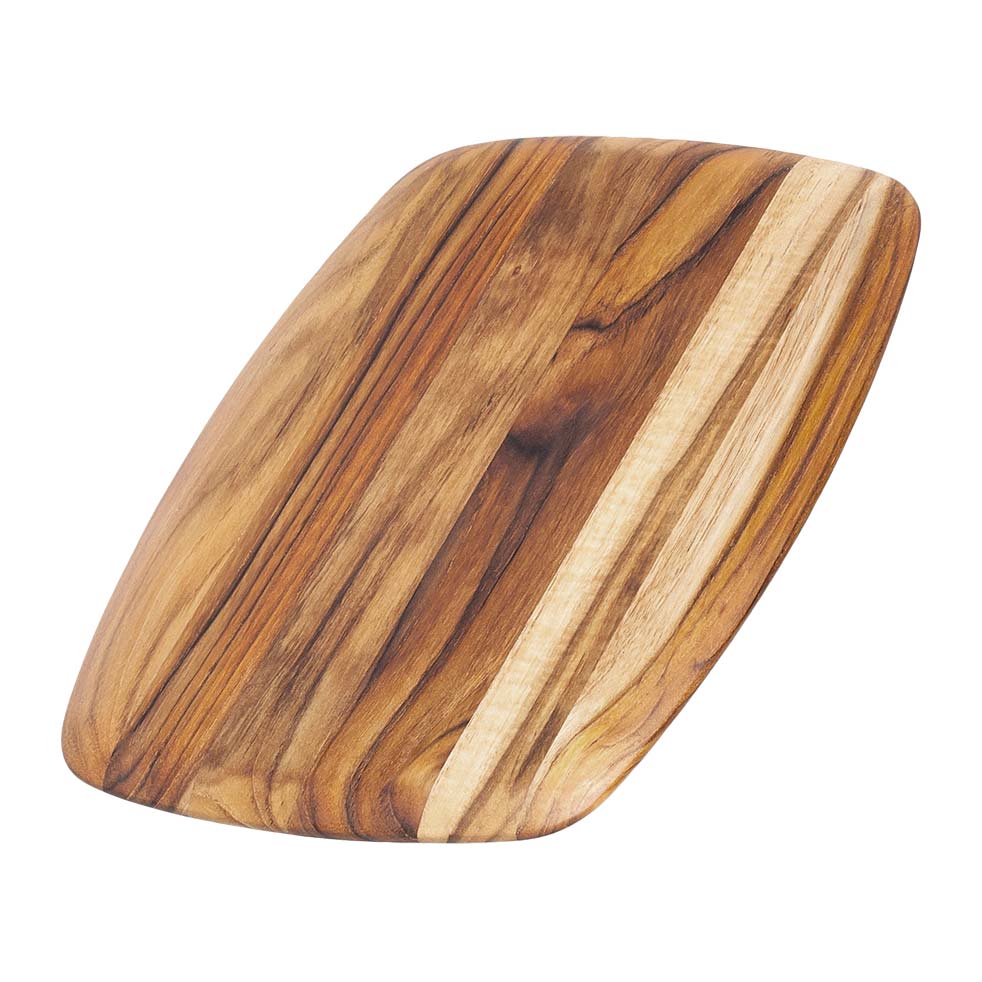 Small teakwood serving board with rounded edges and a rich natural wood grain.