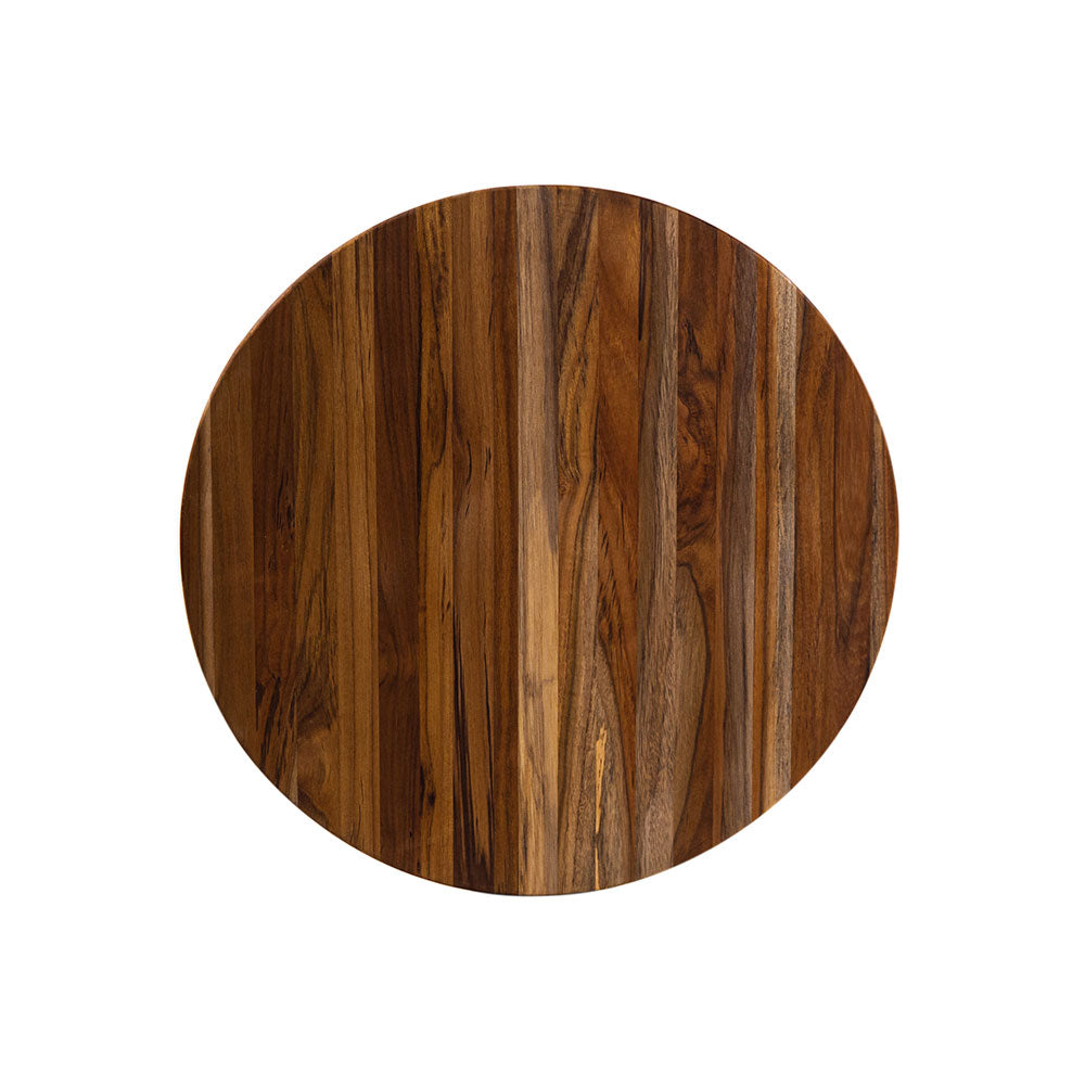 Round edge grain teakwood cutting board with natural vertical wood patterns isolated on a white background.