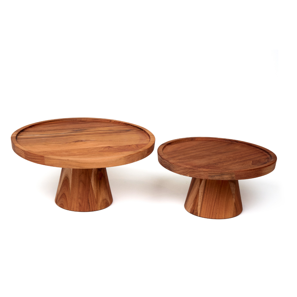 Traditional teakwood cake stands in two sizes with pedestal bases and natural wood grain patterns.