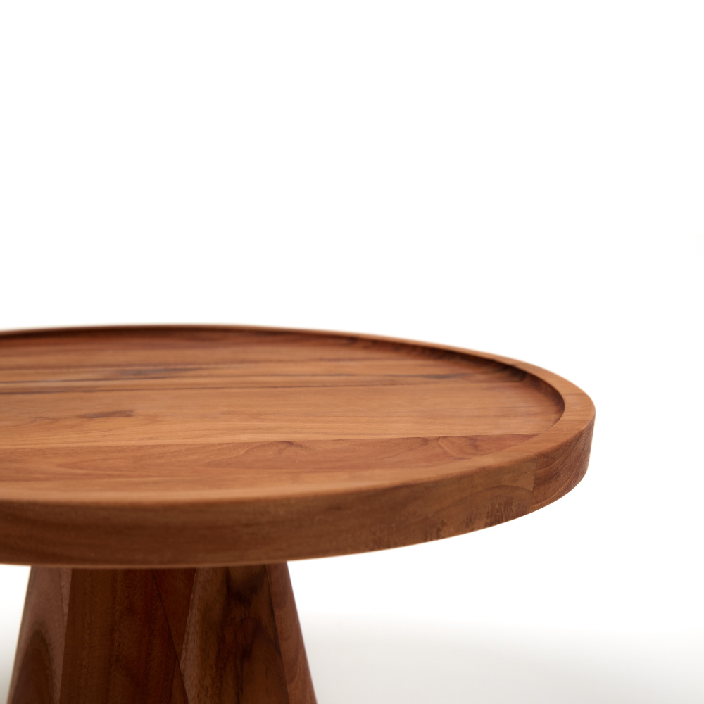 Small traditional teakwood cake stand with a raised edge and rich wood grain patterns.