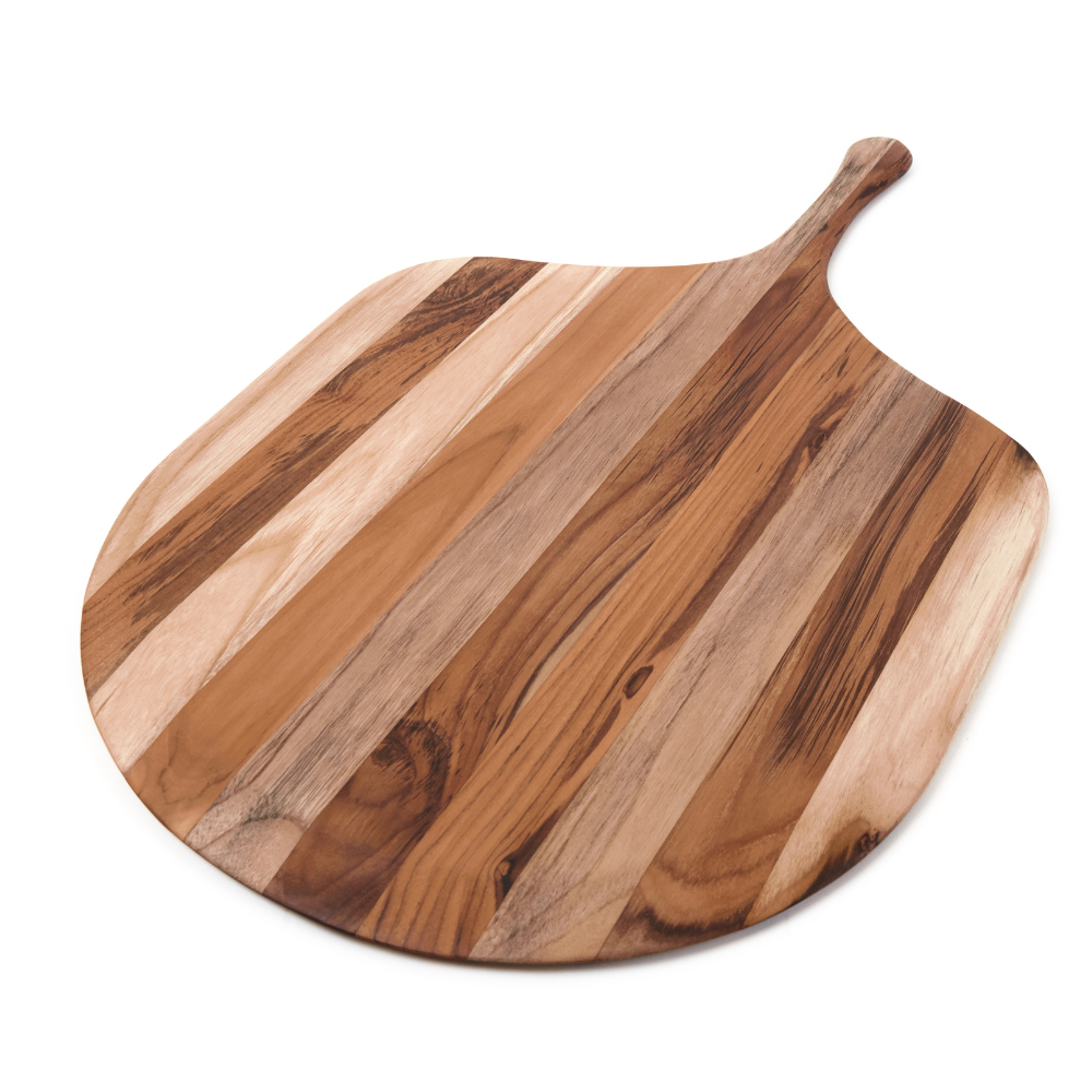 Canoe paddle teak pizza peel with natural edge grain wood patterns isolated on a white background.