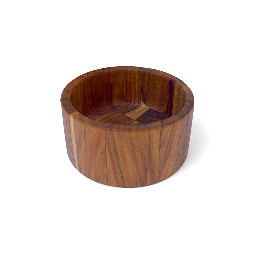 Round teakwood serving bowl with straight sides and natural wood grain patterns isolated on white.