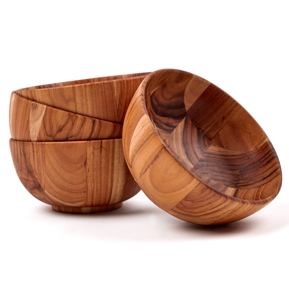 Set of four teakwood moon serving bowls with rich natural grain patterns, isolated on a white background.