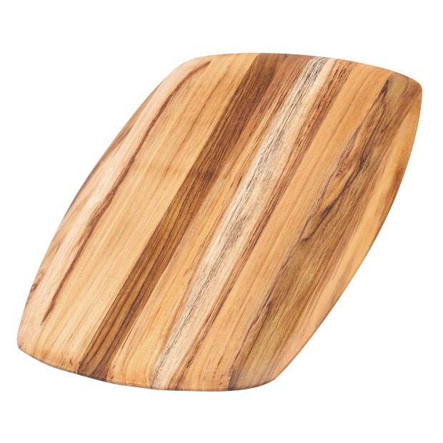 Large teak wood serving board with smooth rounded edges and a natural edge grain finish.