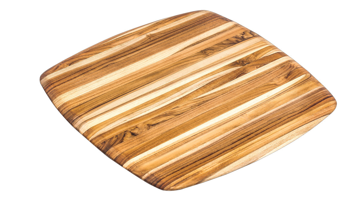 Square teakwood cutting board featuring rounded edges and a rich wood grain pattern for elegant food preparation.