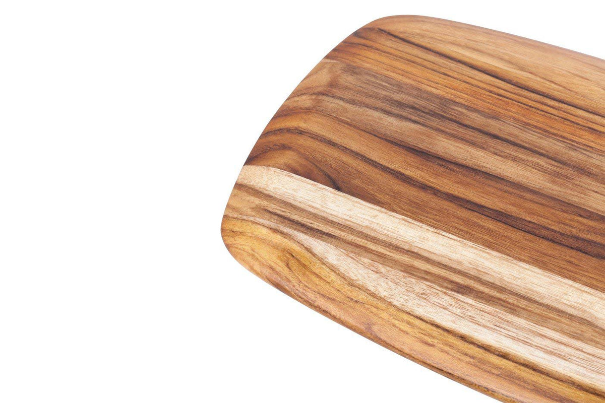 Teak wood serving board featuring smooth rounded edges and a detailed natural edge-grain pattern.